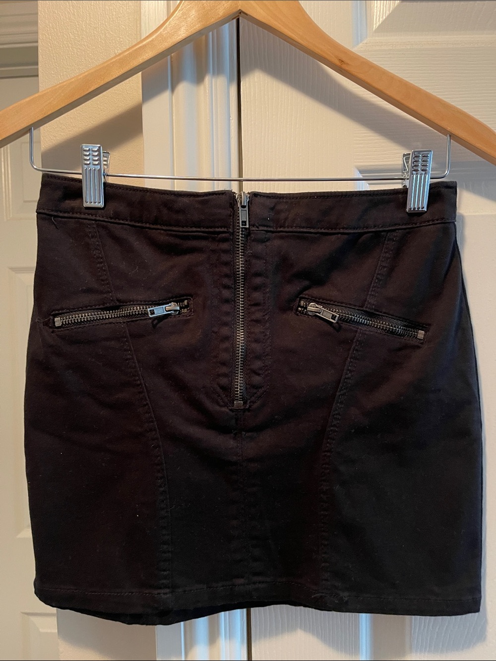 H&M Black Mini Skirt with Front Zip and Pocket Details